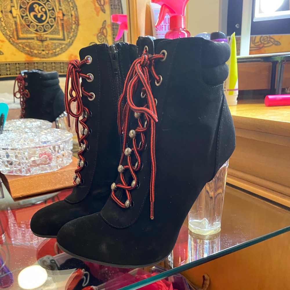 Boutique black booties, clear heel